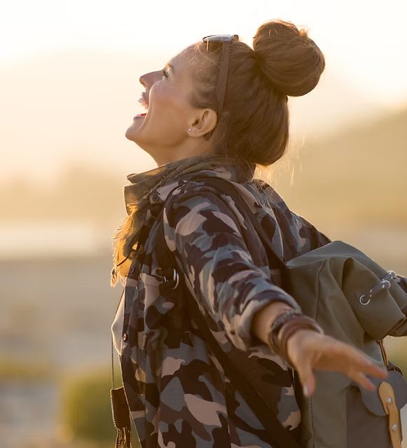 Woman feeling free and hopeful outdoors